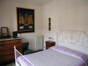 Postel nebo postele na pokoji v ubytování Affittacamere La Casa Di Elide
