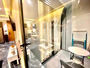a room with a table and a glass door at NEW modern 1 BR, 1min fr tramway in Casablanca +135 photos