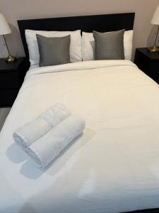 Ένα ή περισσότερα κρεβάτια σε δωμάτιο στο Guest&Rest 1