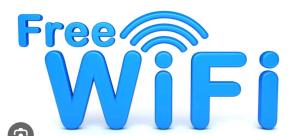una señal que dice wifi gratis con el texto wifi gratis en Hotel BANI, en Kutaisi