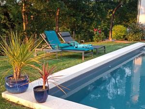 Swimmingpoolen hos eller tæt på Gîte de charme 4 étoiles - Campagne