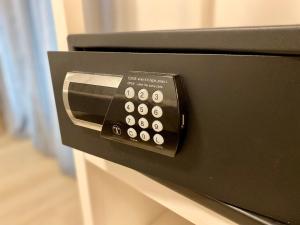 a microwave oven with a bunch of buttons on it at Borgo Incoronata B&B in Vasto