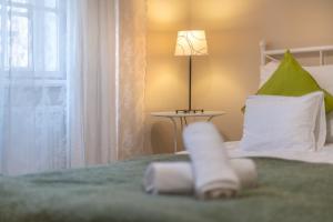 Posteľ alebo postele v izbe v ubytovaní ORANGEHOMES One Bedroom Comfy Apartment