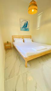 Postel nebo postele na pokoji v ubytování Siviri Lounge Cottage