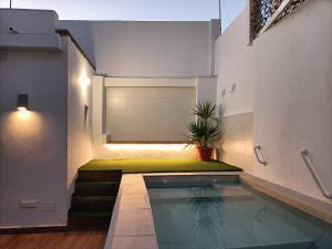 The swimming pool at or close to HELOHOME