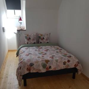 Ένα ή περισσότερα κρεβάτια σε δωμάτιο στο Appartement Malawo