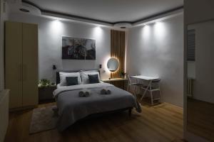 Voodi või voodid majutusasutuse Old Town Rooms toas