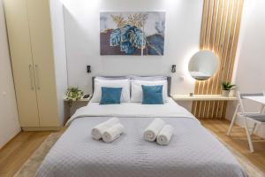 Voodi või voodid majutusasutuse Old Town Rooms toas