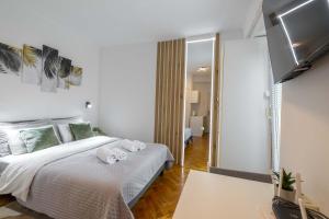 Voodi või voodid majutusasutuse Old Town Rooms toas