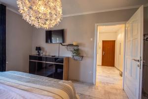 Posteľ alebo postele v izbe v ubytovaní Apartman Pannonica Pin 0-24h