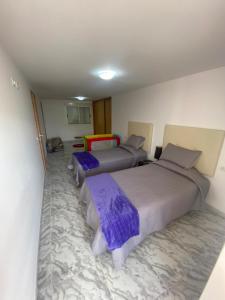 Postel nebo postele na pokoji v ubytování Casa Wolf