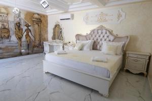 Postel nebo postele na pokoji v ubytování Hotel ŠARS