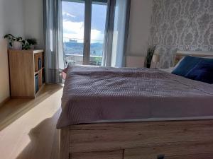 Posteľ alebo postele v izbe v ubytovaní Cozy 2 rooms flat - Castle view