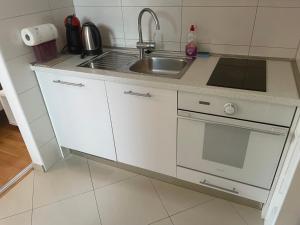 A cozinha ou kitchenette de Apartment Busic in Split
