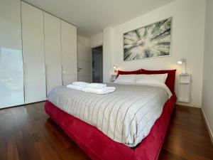 Кровать или кровати в номере La Dolce Vita Arco