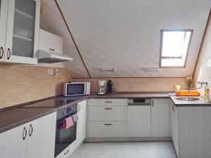 Kuchyňa alebo kuchynka v ubytovaní Hoffman Apartment