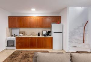 Dapur atau dapur kecil di Olympus DP Betty's apartments +16 gambar