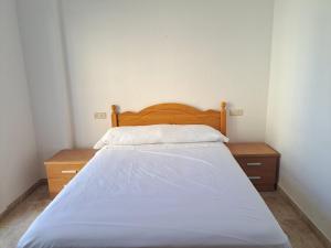 Łóżko lub łóżka w pokoju w obiekcie Apartamento Paseo del Malecón - Garrucha