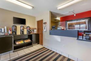 a fast food restaurant with a counter and a snack at Extended Stay America Suites - El Paso - Airport in El Paso