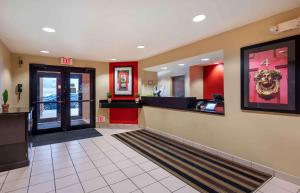 a lobby of a fast food restaurant with a waiting area at Extended Stay America Suites - Dayton - North in Dayton