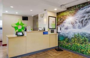 a store with a waterfall mural on the wall at Extended Stay America Suites - Chantilly - Dulles in Chantilly