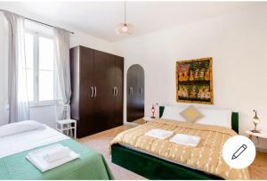 Postel nebo postele na pokoji v ubytování Rooms in Chiassetto