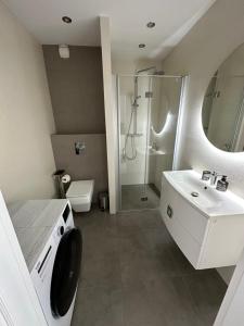 Kúpeľňa v ubytovaní Capital Towers Comfy Apartament & Darmowy parking & Samozameldowanie