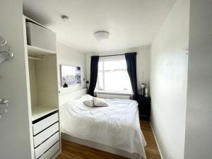 Postel nebo postele na pokoji v ubytování Apartment in Reykjavik