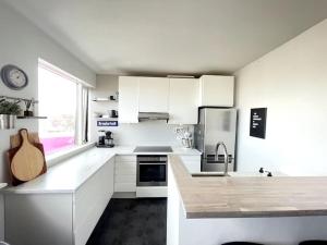 Kuchyň nebo kuchyňský kout v ubytování Apartment in Reykjavik