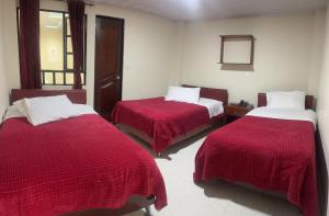 Postel nebo postele na pokoji v ubytování Hotel Vigua