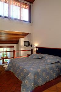 Кровать или кровати в номере Terracota Hotel
