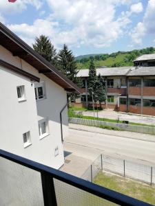 a view from the balcony of a school building at Apartman Mušinbegović in Visoko