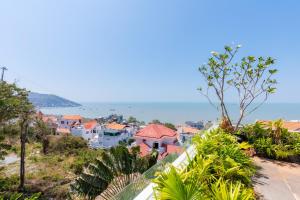 a view of a city with the ocean in the background at Cosa villages in Vung Tau