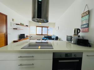 Kuchnia lub aneks kuchenny w obiekcie Casa One Love El Cotillo