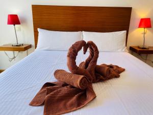 Łóżko lub łóżka w pokoju w obiekcie Casa One Love El Cotillo