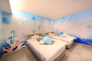 Letto o letti in una camera di Yuyado Mikannoki