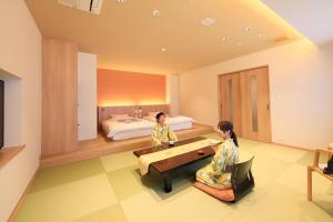 Letto o letti in una camera di Yuyado Mikannoki