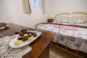 Uma cama ou camas num quarto em Casa soleggiata sull'altopiano