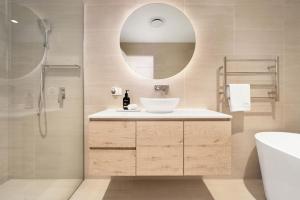A bathroom at The View by Experience Jervis Bay