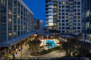 a view of a building with a pool and buildings at Epicurean Atlanta, Autograph Collection in Atlanta