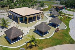 an overhead view of a resort with a roof at Residencial ILOA in Barra de São Miguel