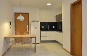 A kitchen or kitchenette at Residencial ILOA