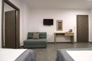 TV a/nebo společenská místnost v ubytování Hotel Villa Adrian