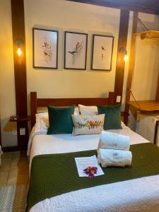 Cama o camas de una habitación en Pousada do Figa