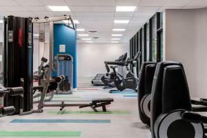 a gym with cardio machines and treadmills at Sheraton Miami Airport Hotel and Executive Meeting Center in Miami