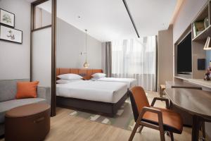 Postel nebo postele na pokoji v ubytování Home2 Suites by Hilton Beijing Shunyi