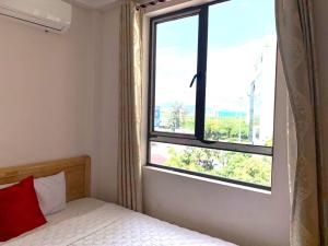 Giường trong phòng chung tại Quynh Yen Hotel