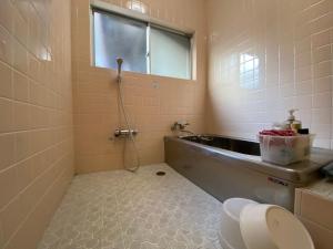 Koupelna v ubytování Abuden in Kumano for women and families 女性と家族専用の宿