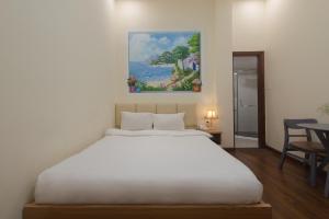 Voodi või voodid majutusasutuse Tasme Hotel toas
