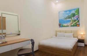 Voodi või voodid majutusasutuse Tasme Hotel toas